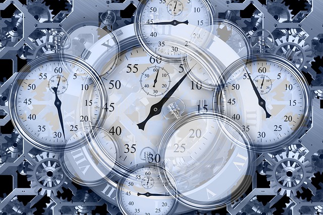 Multiple transparent clock faces overlaying each other and gears in the background