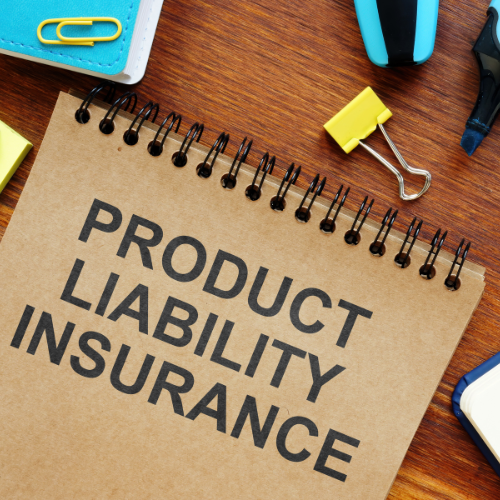 notebook labeled product liability insurance sitting on a table